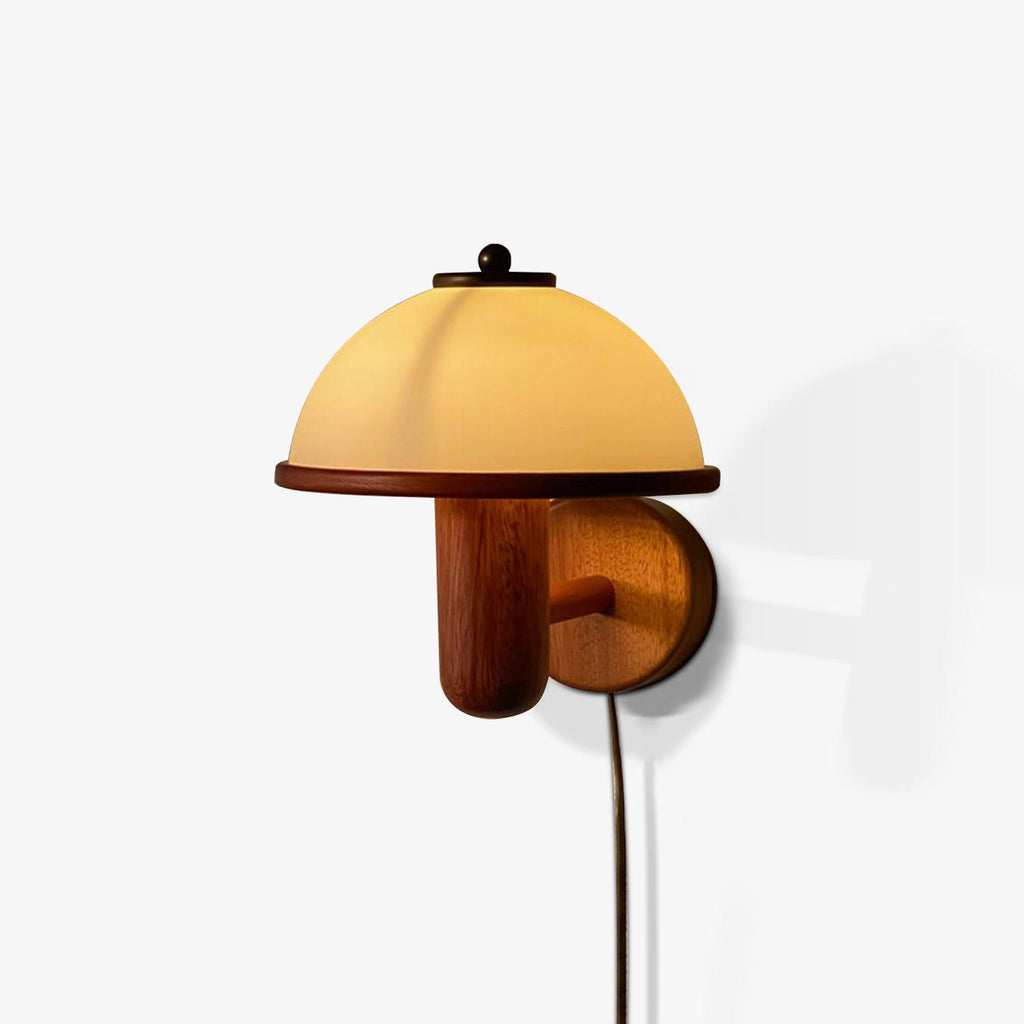 Mushroom wall lamp adding warm accent light to a neutral wall