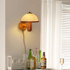 Mushroom wall lamp lighting a calm bedroom corner