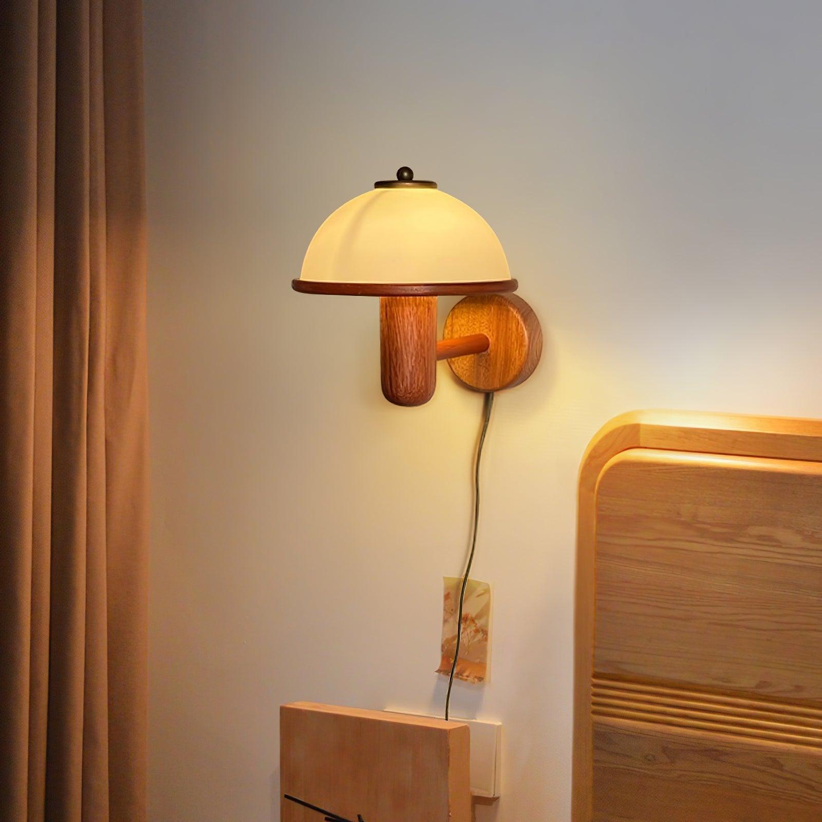 Oak mushroom wall lamp lighting a neutral-toned interior wall