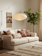 White swag pendant draped from two ceiling hooks