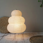 White washi paper lamp shade casting a gentle warm glow
