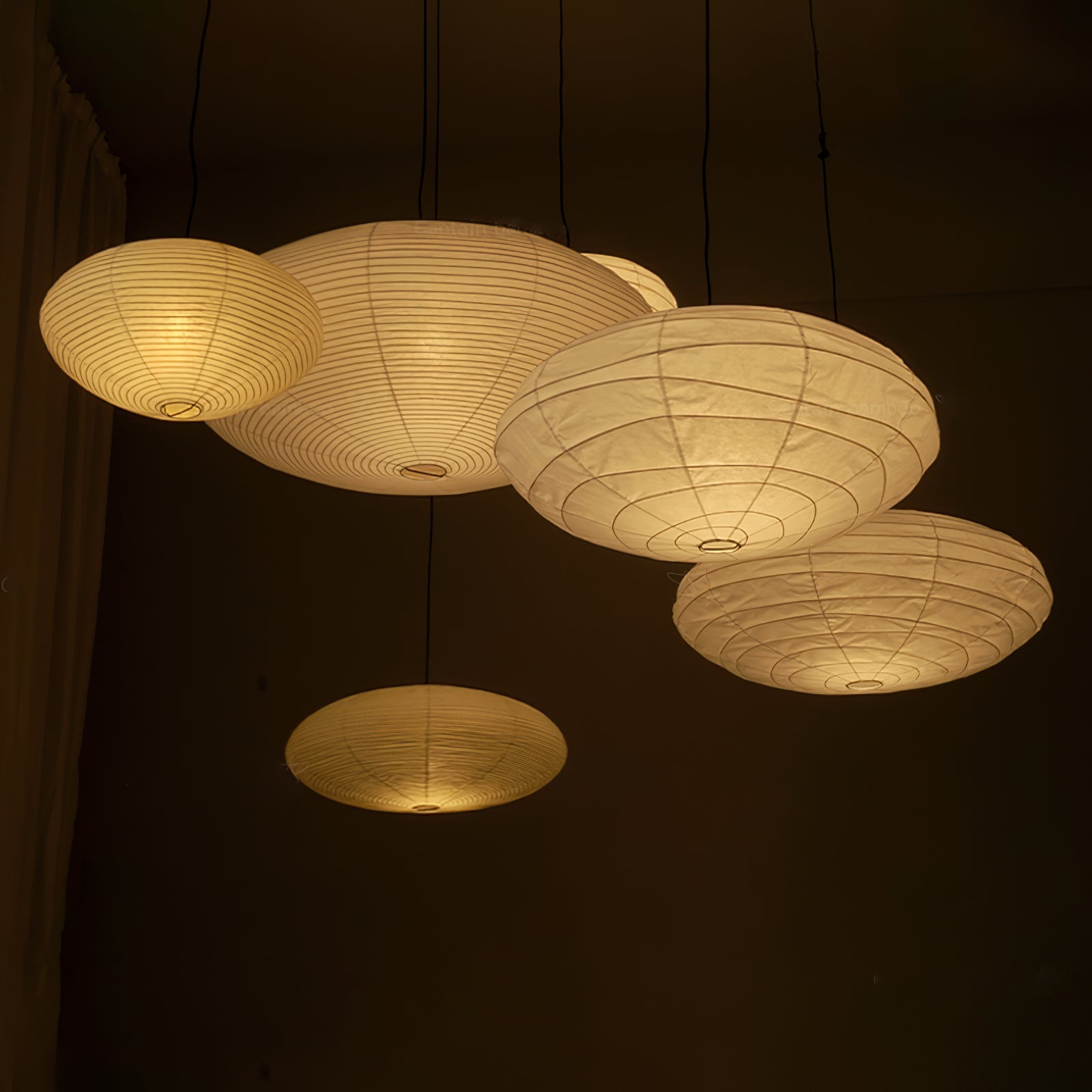 Washi paper pendant light with warm diffused illumination
