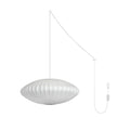 Nelson Bubble Swag Pendant Light with white steel wireframe glowing in a styled room