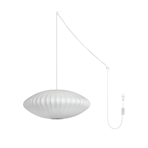 Nelson Bubble Swag Pendant Light with white steel wireframe glowing in a styled room
