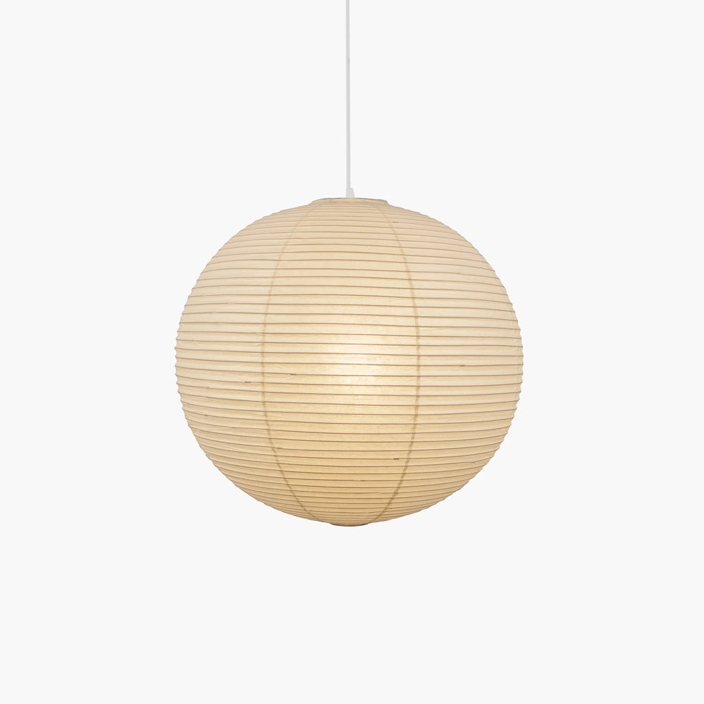 White paper pendant lamp hung from an adjustable cable