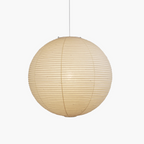 White washi paper pendant shade lit from inside
