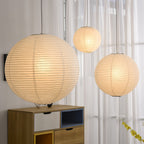 Mulberry paper pendant glowing in a calm interior