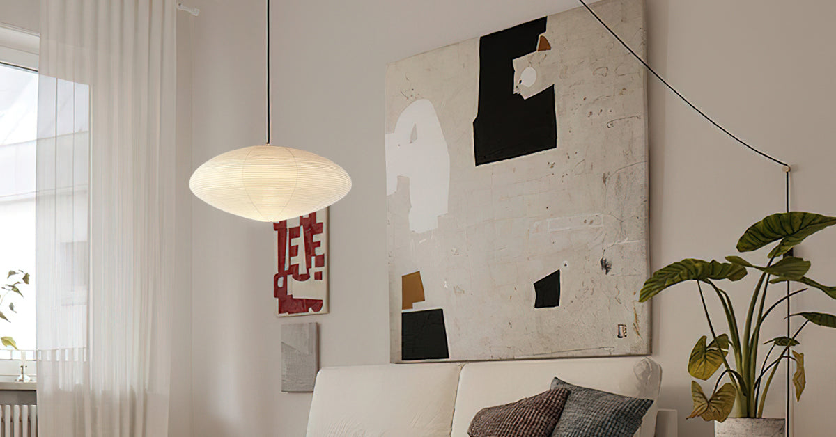 Handmade paper pendant light casting a warm glow