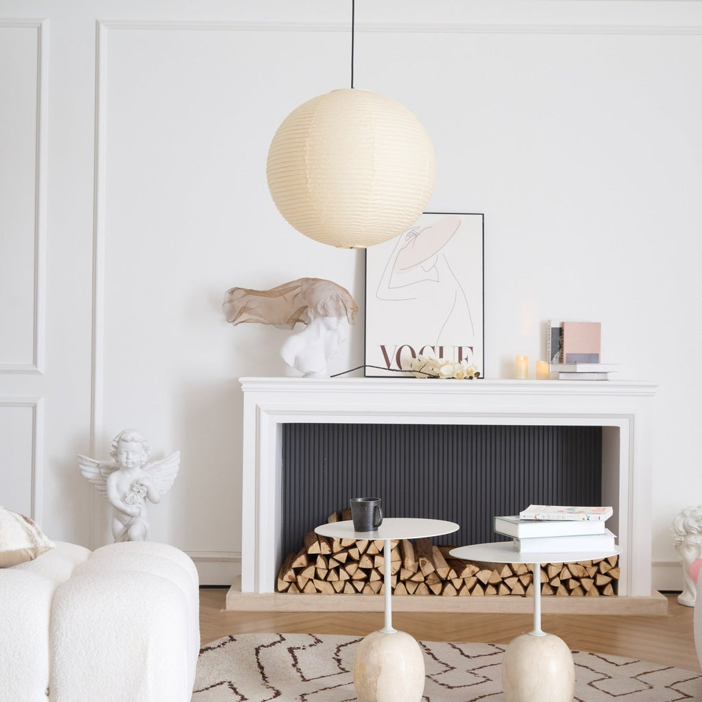 Round paper pendant light styled over a dining area