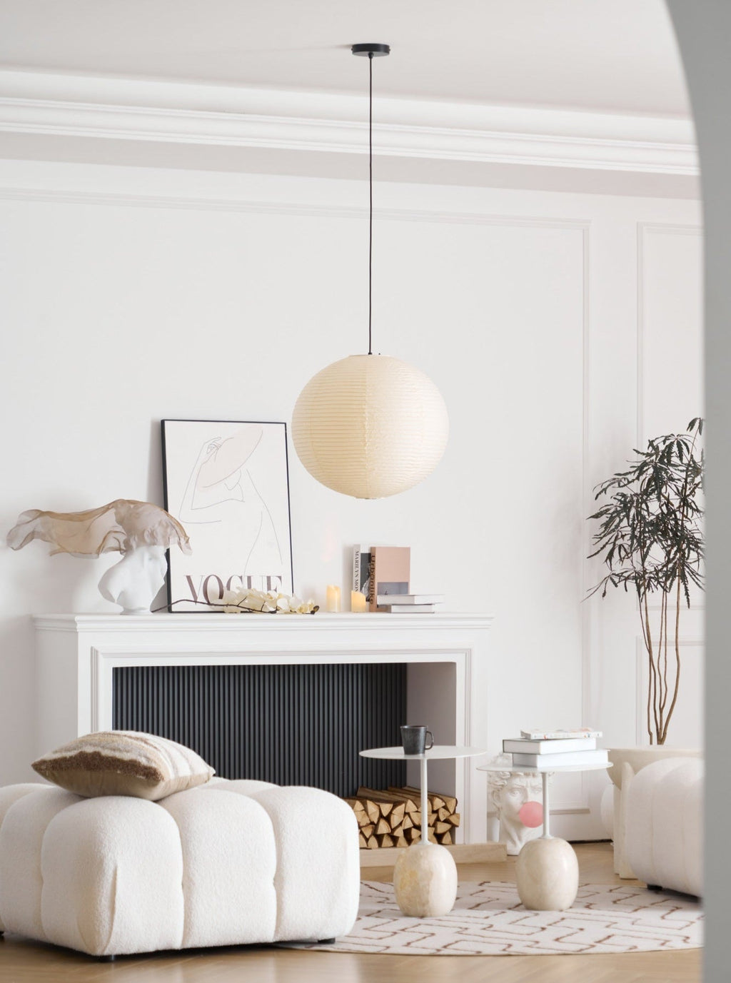 Paper ceiling pendant casting a gentle warm glow