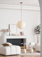 Paper ceiling pendant casting a gentle warm glow