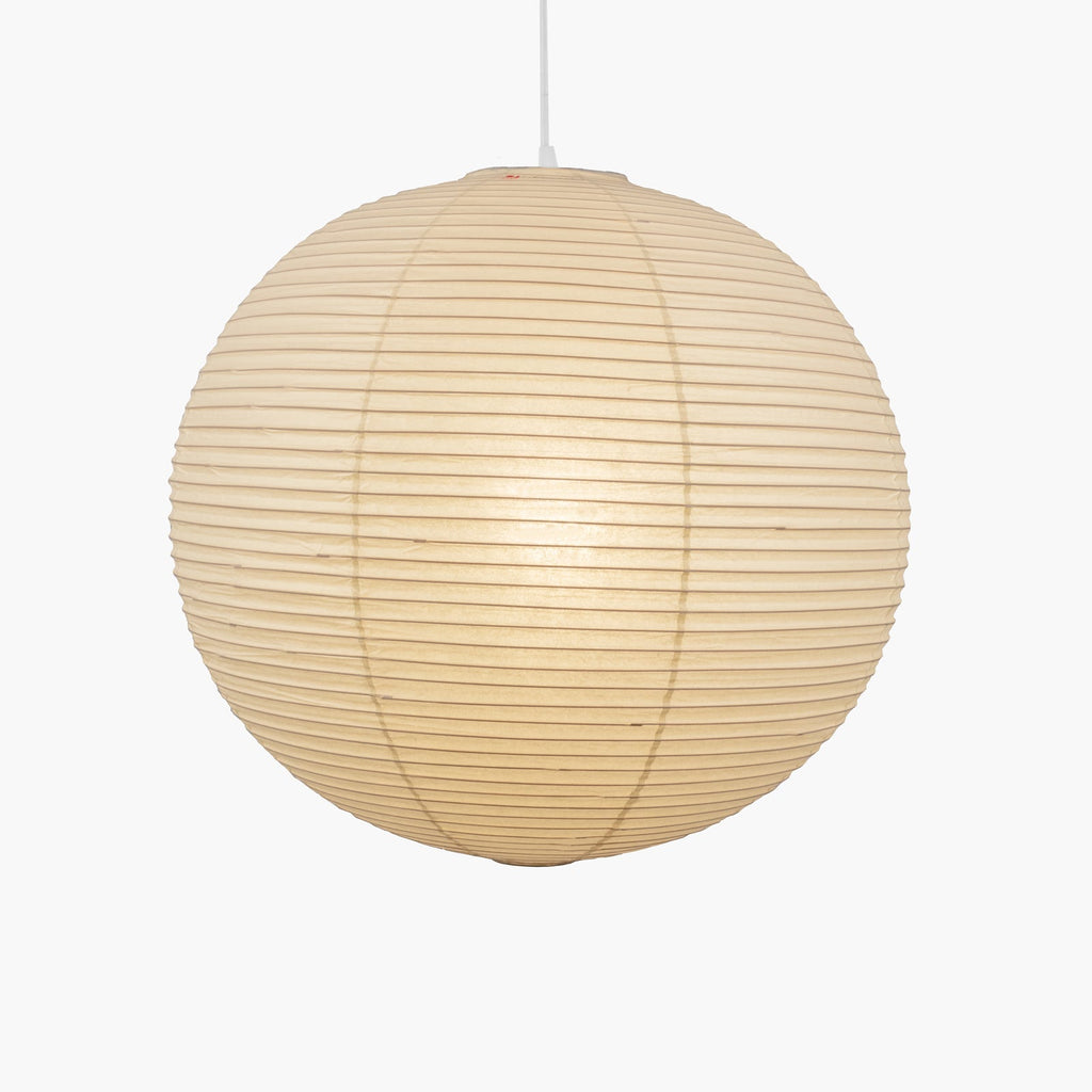 Round paper pendant light styled in an interior