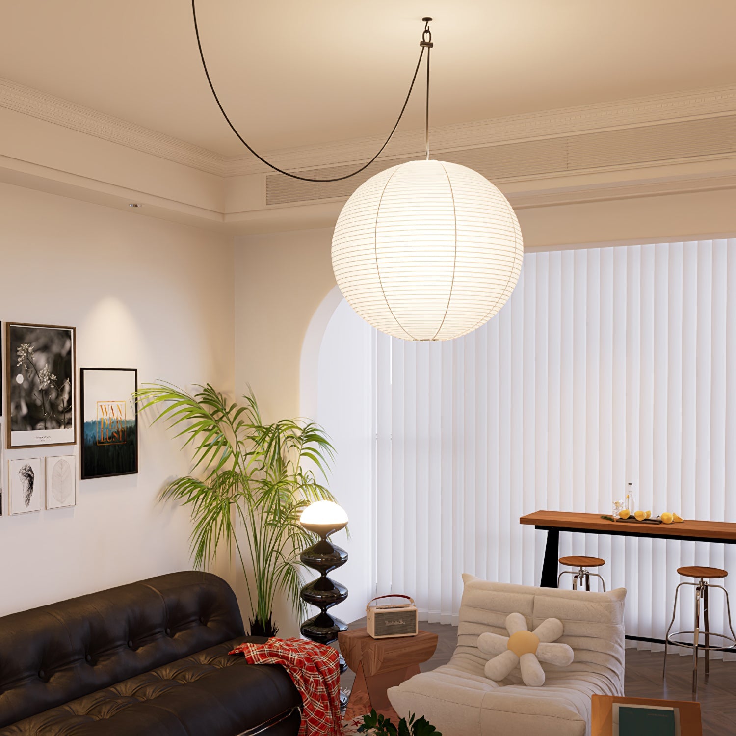 Mulberry paper globe pendant light glowing in an interior