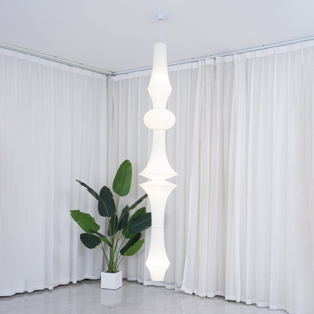 Tall washi paper pendant hung from an adjustable cable