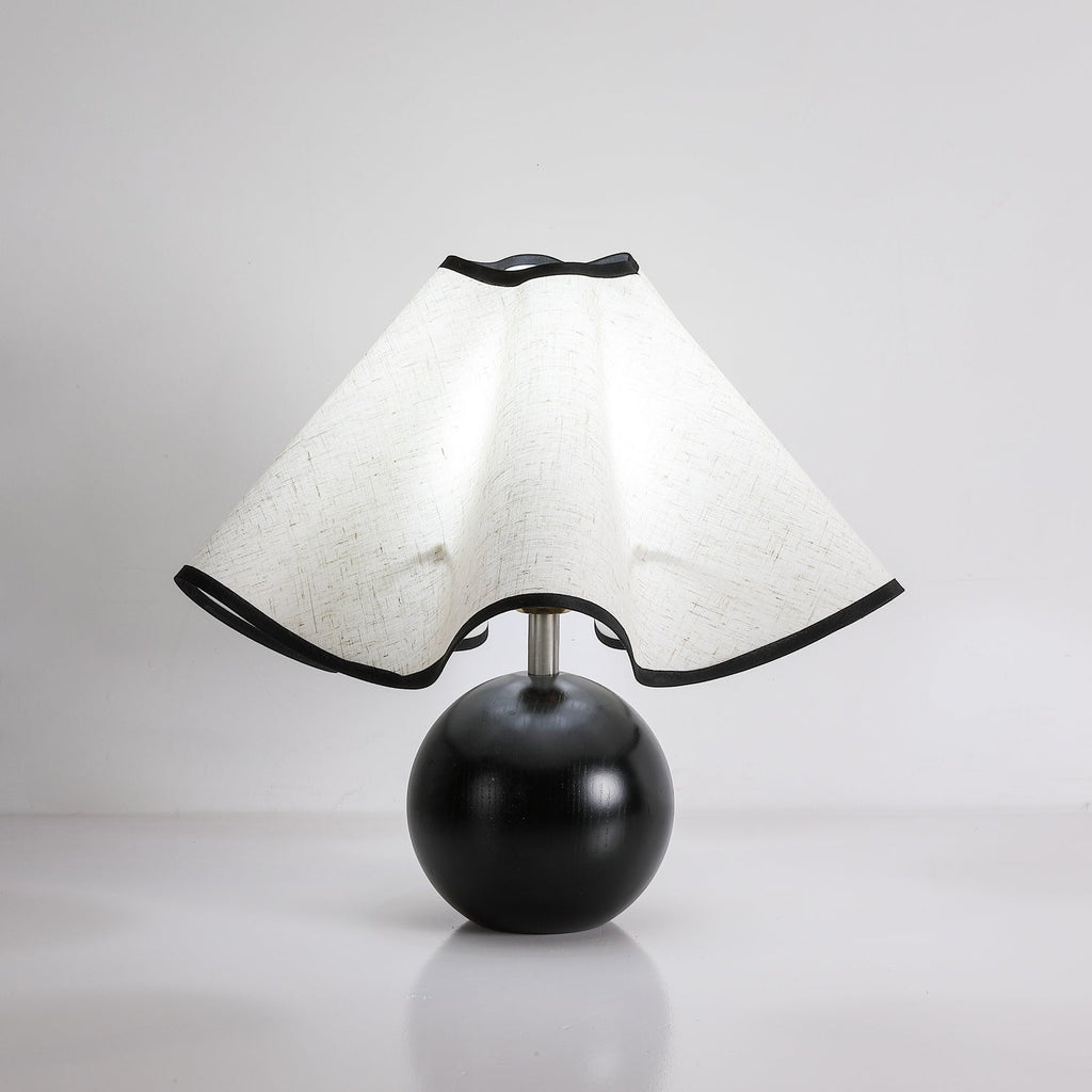 Wavecrest table lamp detail of the wood base grain