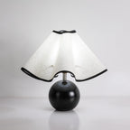 Wavecrest table lamp detail of the wood base grain