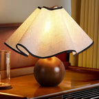 Wavecrest table lamp close-up of the wave-draped shade edge