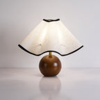 Wavecrest table lamp side profile with curved shade silhouette