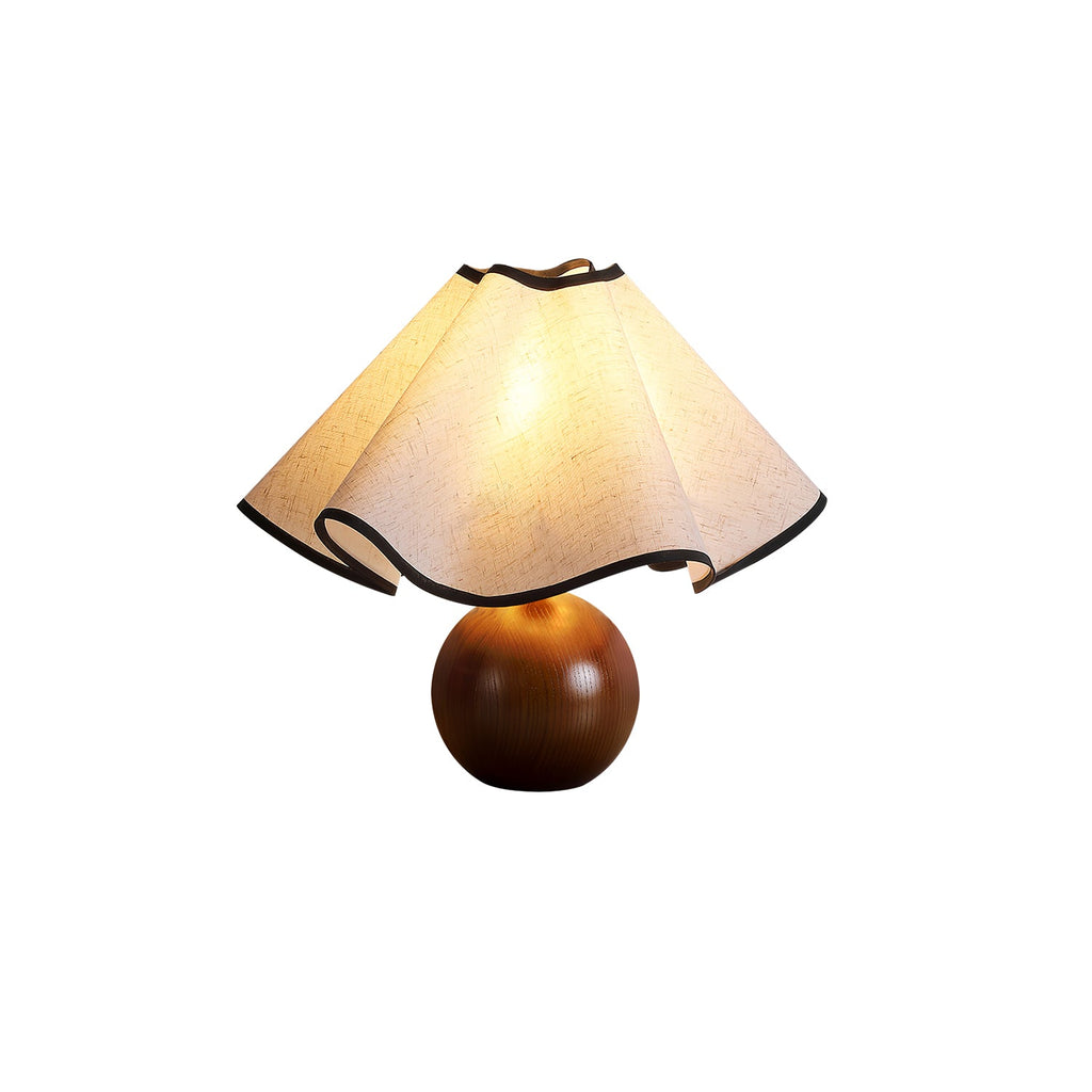 Wavecrest table lamp glowing warmly as an evening accent light