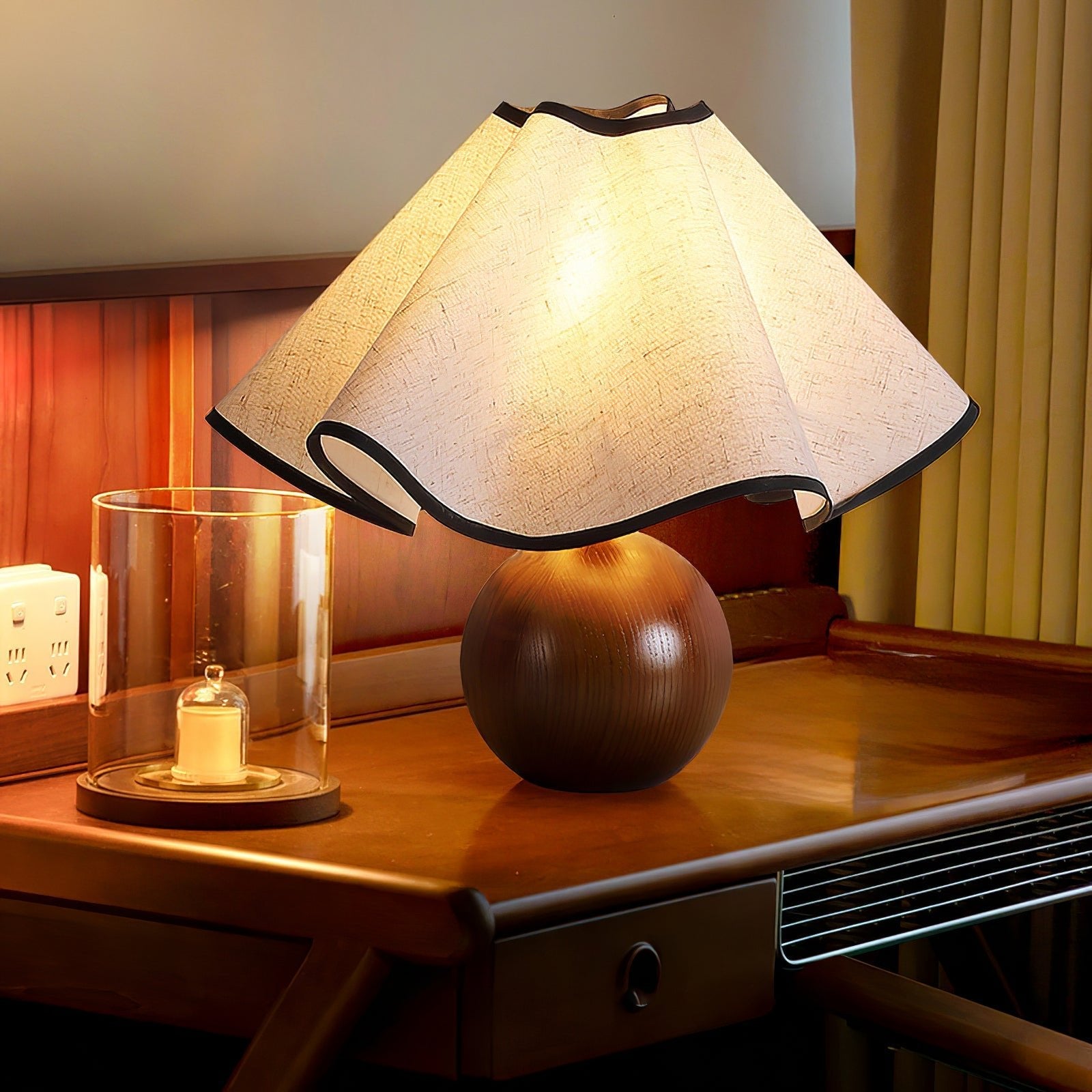 Wavecrest table lamp on a wood base set in a coastal-styled interior