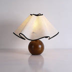 Wavecrest table lamp with black base and linen shade