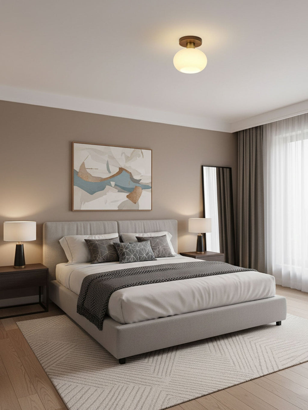 In a bedroom corner, one of these Clérachic ceiling lights glows warm above grey bed linens.
