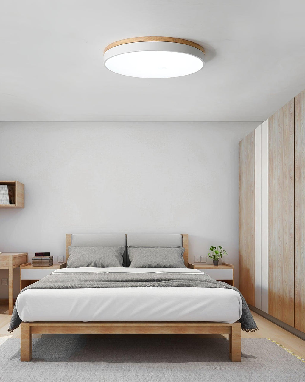Round wood and white ceiling light in a calm interior