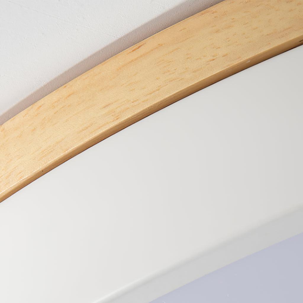 Wooden rim ceiling light detail showing the white panel