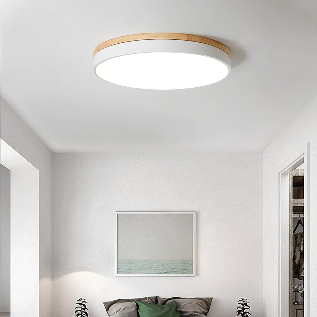 Flush mount ceiling light with wood trim turned off