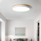 Flush mount ceiling light with wood trim turned off