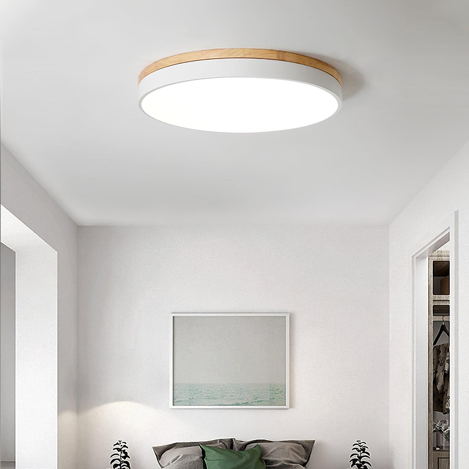 Flush mount ceiling light with wood trim turned off