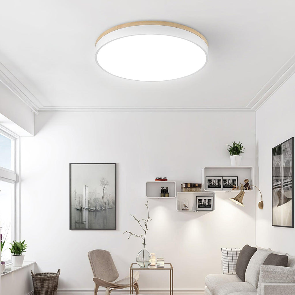 White ceiling light with wood edge in a neutral room