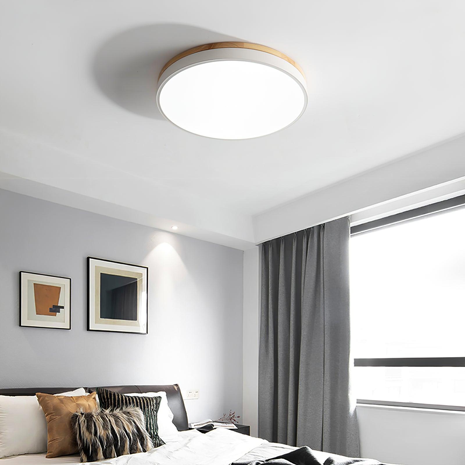 Round flush mount ceiling light close up of the wood ring