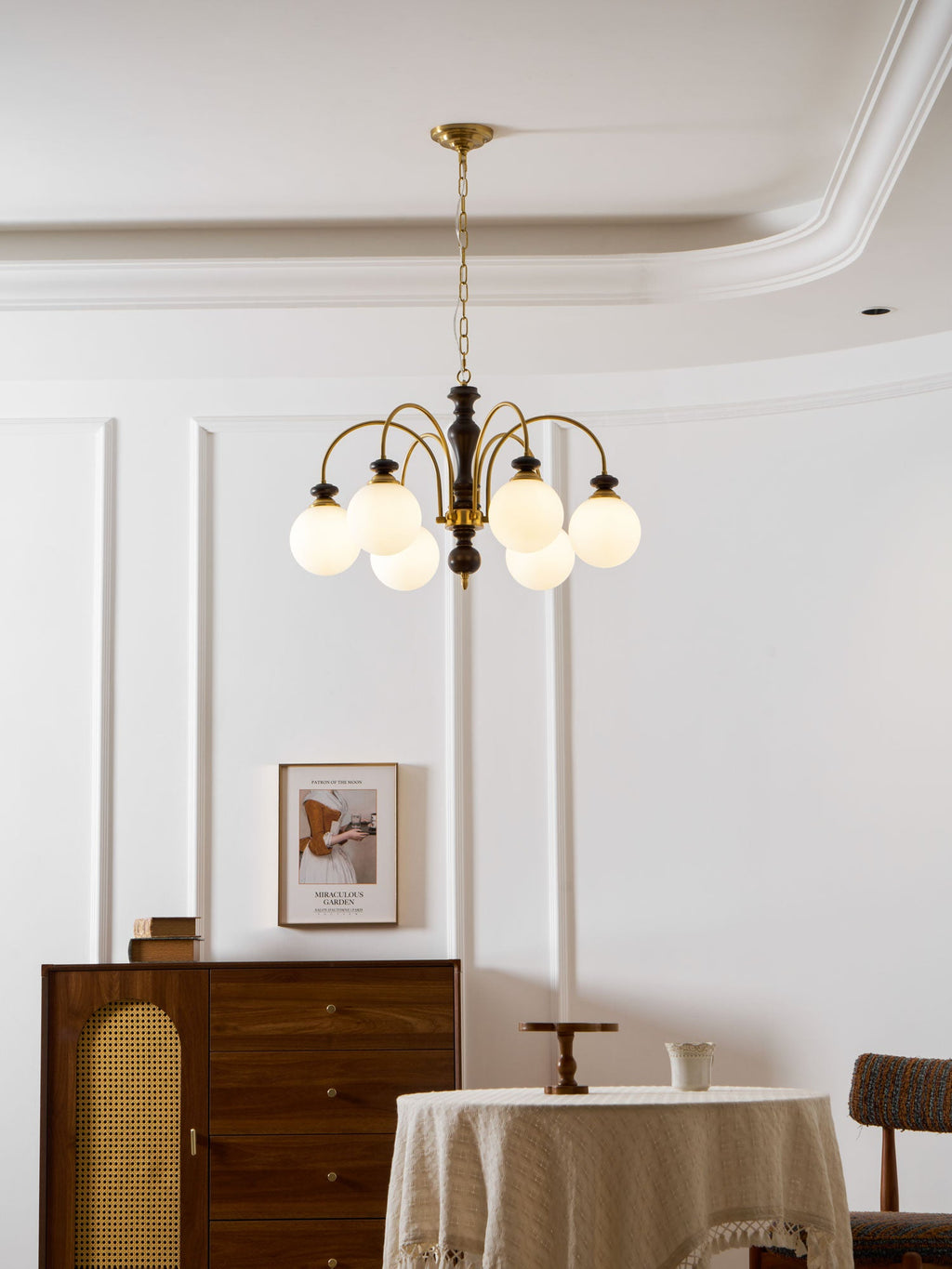 Black and nickel chandelier with curved arms detail