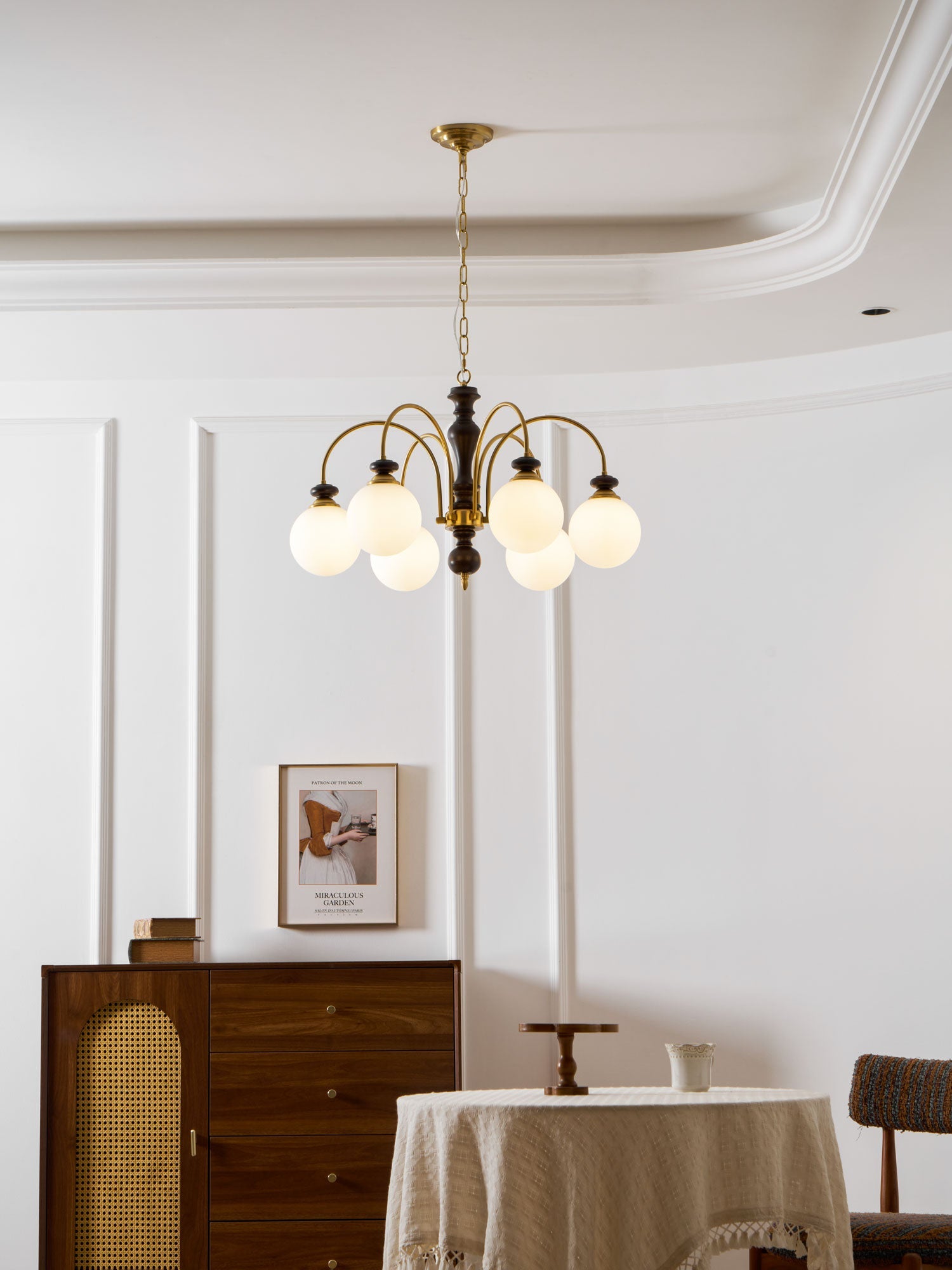 Black and nickel chandelier with curved arms detail