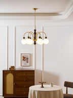 Black nickel chandelier with six candle lights glowing