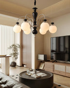 Classic chandelier arms detail in black and nickel finish
