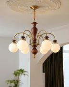 Walnut gold chandelier close up of the candle sockets