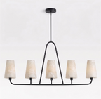 Front view on a plain white background, this Clérachic chandelier's matte black frame supports five alabaster cone shades.