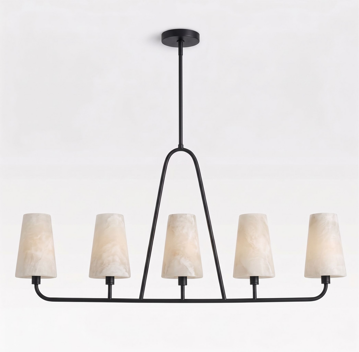 Front view on a plain white background, this Clérachic chandelier's matte black frame supports five alabaster cone shades.