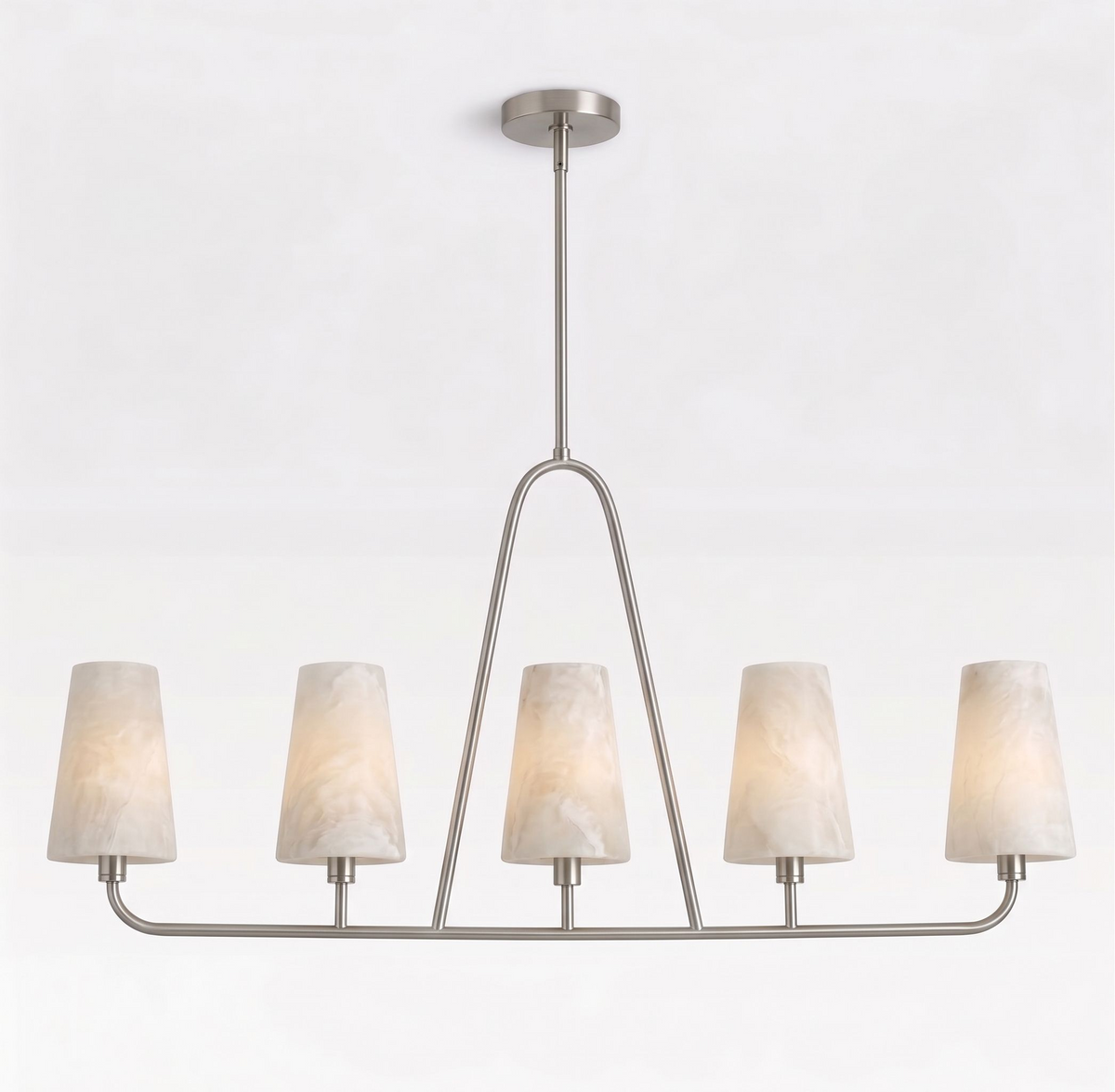 Studio shot against a bare backdrop, this Clérachic chandelier shows its brushed nickel triangular stem and five hanging shades.