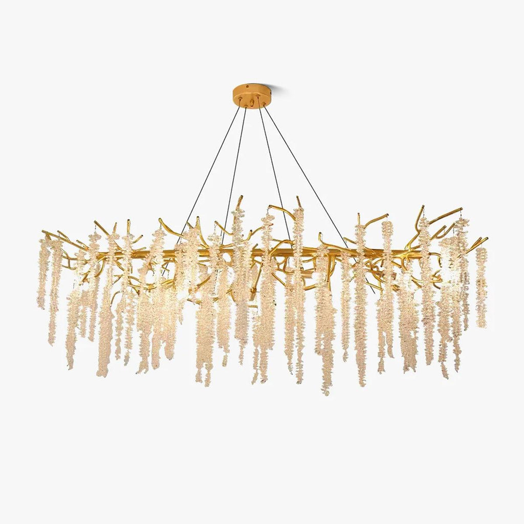The linear chandelier on white, warm-toned crystal strands hanging in a long unbroken row.