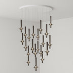 A dense cluster of black-stemmed Clérachic pendants cascades from a round canopy, lit in clear glass in a grey corner room.
