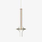 This Clérachic pendant is shown on a plain light background with a rose-gold neck and clear tapered glass, unlit.