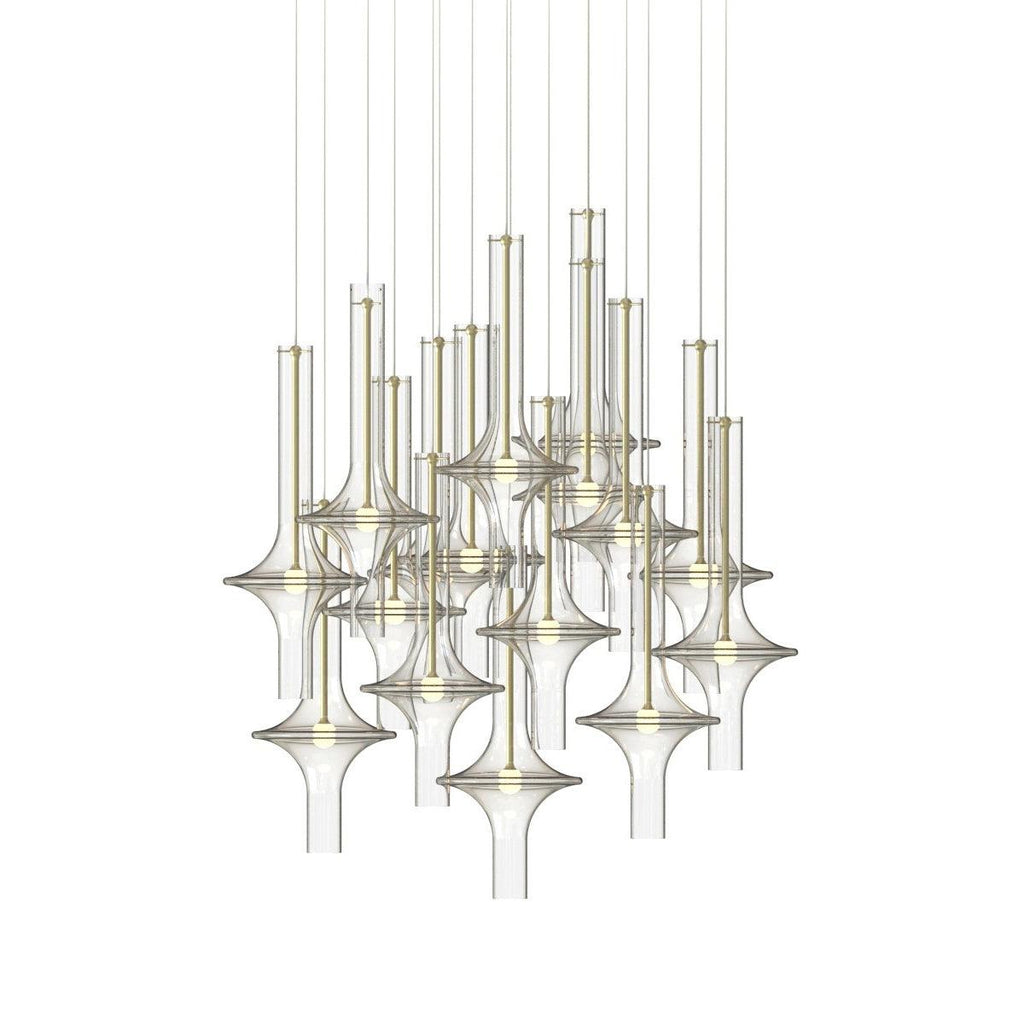 A cluster of gold-stemmed Clérachic pendants in clear glass is shown unlit against a plain white backdrop.