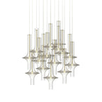 A cluster of gold-stemmed Clérachic pendants in clear glass is shown unlit against a plain white backdrop.