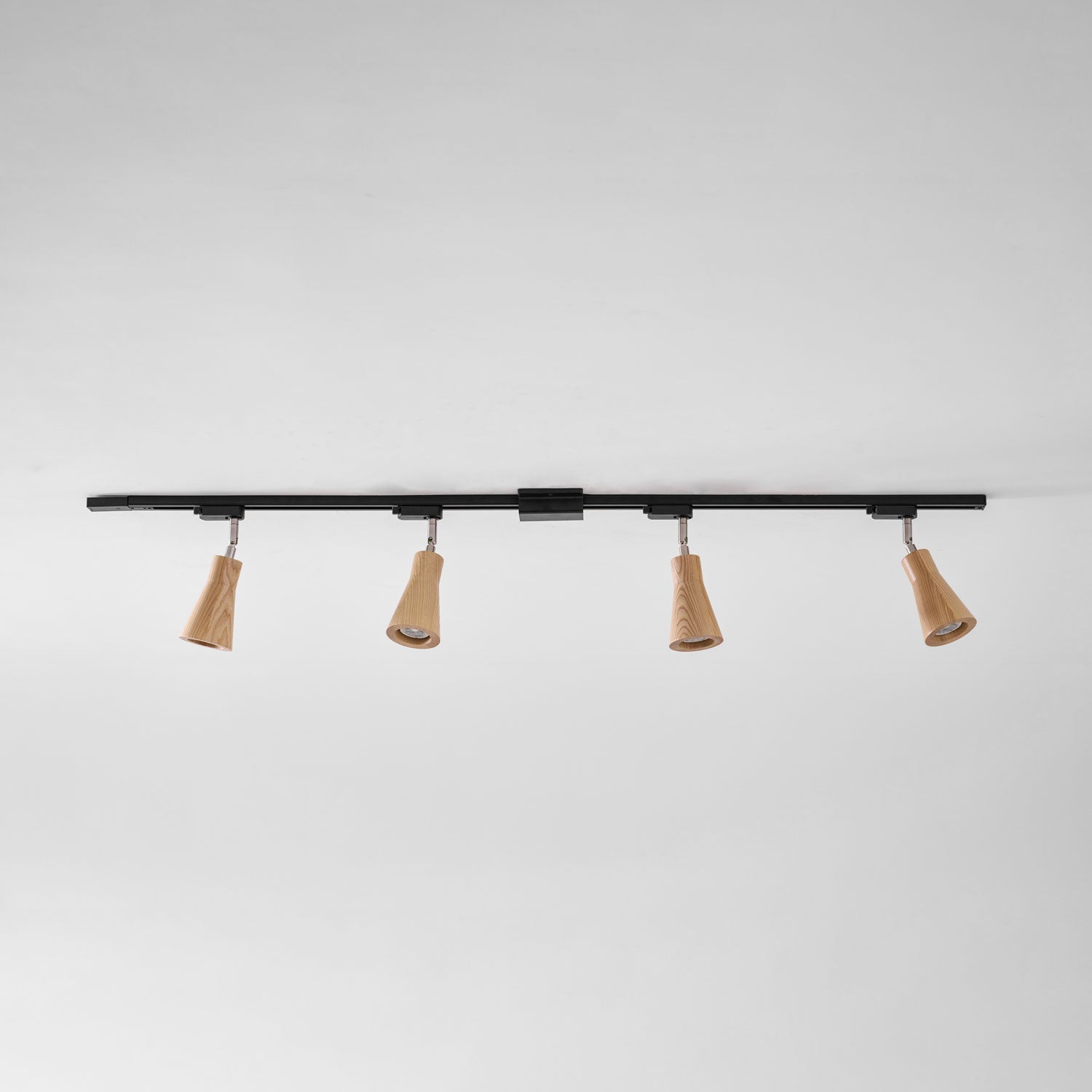 Wood track ceiling lamp shown with three angled spotlight heads