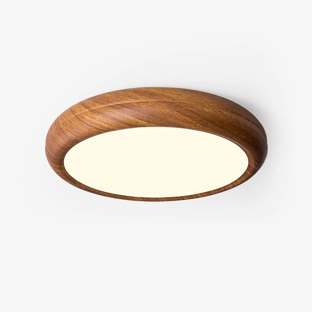Round walnut ceiling light shown against a plain ceiling