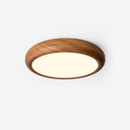 Walnut round ceiling light mounted on a low ceiling