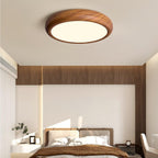 Wood grain flush mount ceiling light in a bright room